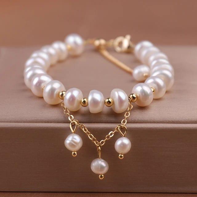 Elegant beaded gold plated pearl bracelet and necklace