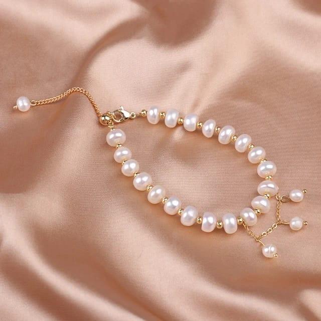 Elegant beaded gold plated pearl bracelet and necklace